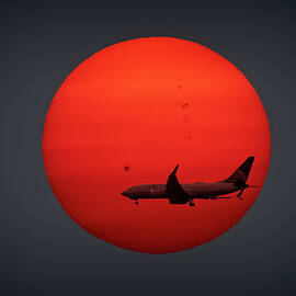 EWR Inbound Sunset by Susan Candelario