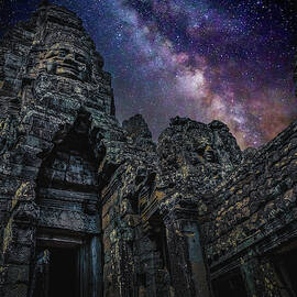Faces of Bayon Under the Milky Way by Rebecca Herranen
