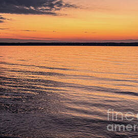 First Light Over Calm Waters by William Norton