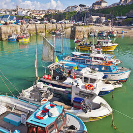 Fishing boats in harbour, Newquay, Cornwall, England, UK by Neale And Judith Clark