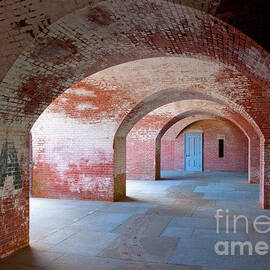 Blue door at Fort Point arches, San Francisco, California, USA by Neale And Judith Clark