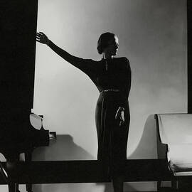 Frances Douelon Posing Beside a Piano by Edward Steichen