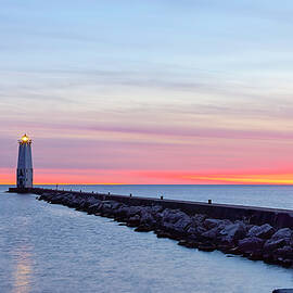 Frankfort North Pier Light at Dramatic Sunset by Michael Collins