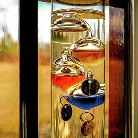 Galileo Thermometer In The Window, by Jeff Sinon