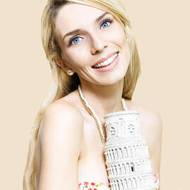 Girl reminiscing a trip to europe with a memento by Jorgo Photography