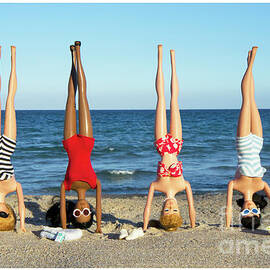 Girls Headstands by David Parise