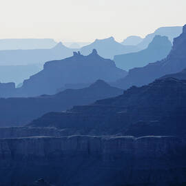 Grand Canyon blue silhouettes by Tatiana Travelways
