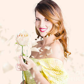 Grateful woman giving white rose by Jorgo Photography