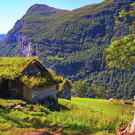 Historic Skagefla Mountain Farm Overlooking Geirangerfjord in Norway by Miroslav Liska