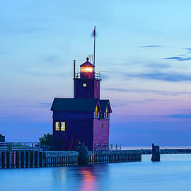 Holland Harbor Lighthouse at Dusk by Michael Collins