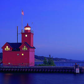 Holland Harbor Lighthouse at Twilight by Michael Collins