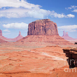 Horse Rider at John Fords Point, Merrick Butte, Monument Valley Navajo Tribal Park, Arizona, USA by Neale And Judith Clark