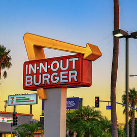 In-N-Out Burger Sign at Sunset in Los Angeles, California by Miroslav Liska