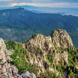 Jagged Peaks of the Sandias by Howard Holley