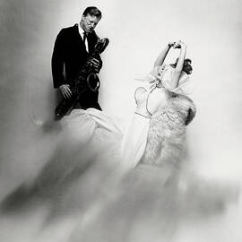 Jazz Musician Gerry Mulligan and model Monique Chevalier by Bert Stern