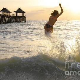 Joyful Leap into Sunset Waves 3400 by Donn Ingemie