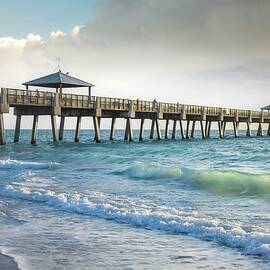 Juno Beach Florida Pier Sunrise with Rolling Waves by Rebecca Herranen