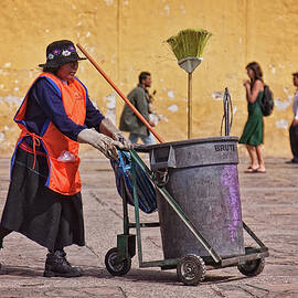 Lady street sweeper by Tatiana Travelways