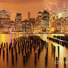 Lightening Strikes over New York Skyline by Neale And Judith Clark