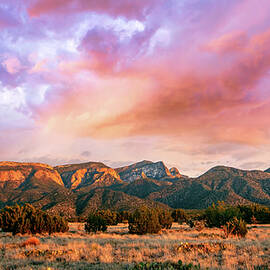 Magenta Skies over the Sandias by Howard Holley