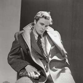 Marlon Brando Holding a Novel by Cecil Beaton