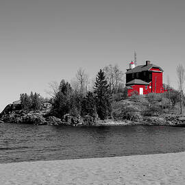 Marquette Harbor Lighthouse on Rocky Shore by Vi Ray