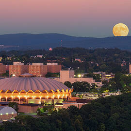 Moon rising above the Coliseum at WVU by Steven Heap