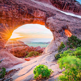 Morning Light Through Partition Arch, Devils Garden, Arches National Park, Utah by Edgars Erglis