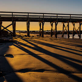 Morning Light Under The Pier.  by Jeff Sinon