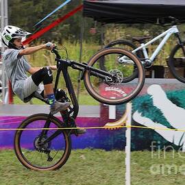 Mountain Biking Stunt in Action 2478 by Donn Ingemie