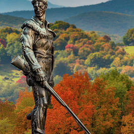 Mountaineer statue from WVU with fall leaves in West Virginia by Steven Heap