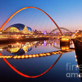 Newcastle upon Tyne skyline and Millennium bridge, England by Neale And Judith Clark