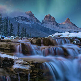 Northern Lights Over Snow-Capped Three Sisters by Thomas Nay