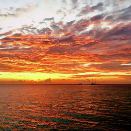 Orange Sunset in the Maldives by Waterdancer