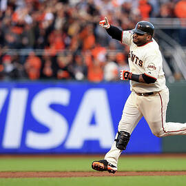 Pablo Sandoval and Justin Verlander by Doug Pensinger