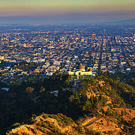 Panorama of Griffith Observatory and Los Angeles skyline at sunset by Miroslav Liska