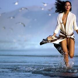 Pat Cleveland Running On The Beach by Jacques Malignon