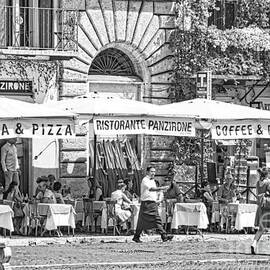 People Dining Outside An Osteria on the Square - Italy  by Stefano Senise