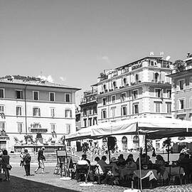 Piazza Santa Maria in Trastevere in Rome  by Stefano Senise