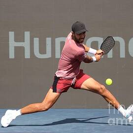 Pickleball Player in Mid-Action 7361 by Donn Ingemie