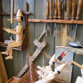 Pinocchio Puppets and Wooden Crafts in Berlin Room by Travel Essayist