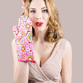 Pinup girl with cookery secrets and handy tips by Jorgo Photography