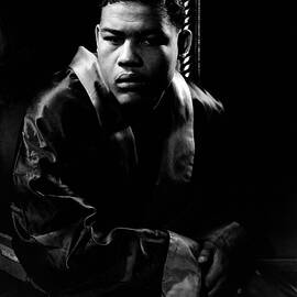 Portrait Of Boxer Joe Louis in His Dressing Room by Lusha Nelson