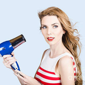 Pretty lady getting a blow dry hair style by Jorgo Photography