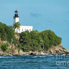 Punta Tuna Lighthouse on a Maunabo Cliff by Beachtown Views