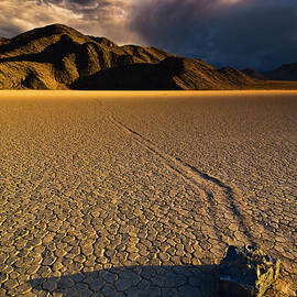Racetrack Playa sliding rock, Death Valley, California by Neale And Judith Clark