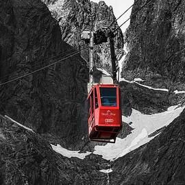 Red Cable Car in Mountain Pass by Robert Grac