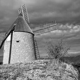 Restored windmill on the hill above St Chinian by Seeables Visual Arts
