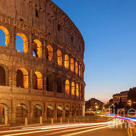 Rome Colosseum at night by Neale And Judith Clark