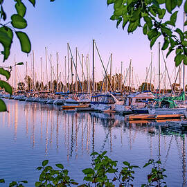 Row of Boats in the Sunset by John Twynam
